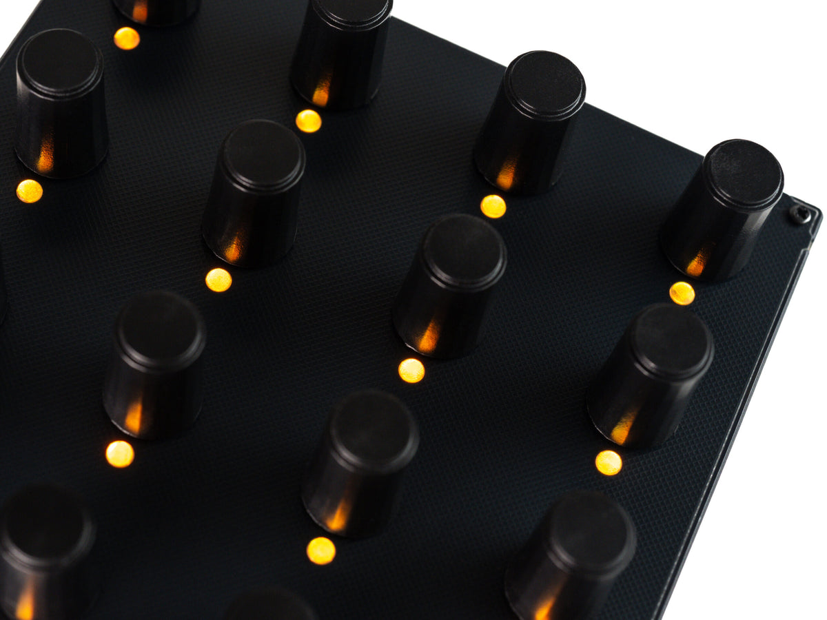 Close-up of Intech Studio EN16 Detent Series 3 MIDI Controller with detailed knob and button layout.