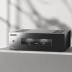 Eversolo AMP-F8 power amplifier on a concrete shelf in soft daylight