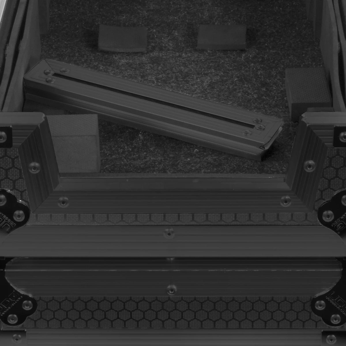 UDG Ultimate Flight Case AlphaTheta DDJ-GRV6 black DJ flight case with laptop shelf and access panel for DJ gear storage.