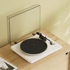 Kanto Audio OBI3 Gen 2 turntable, White, on a wooden console