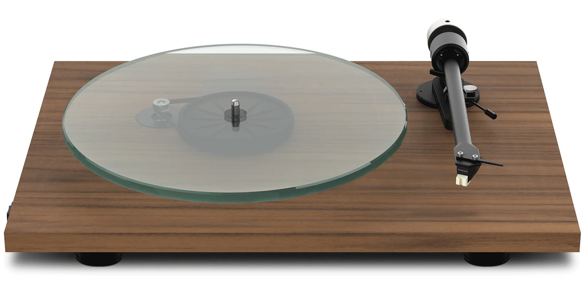 Pro-Ject T2 W walnut finish turntable with a sleek design and tonearm, showcasing high-quality audio equipment.
