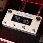 Zoom NEURIG on a pedalboard next to other pedals
